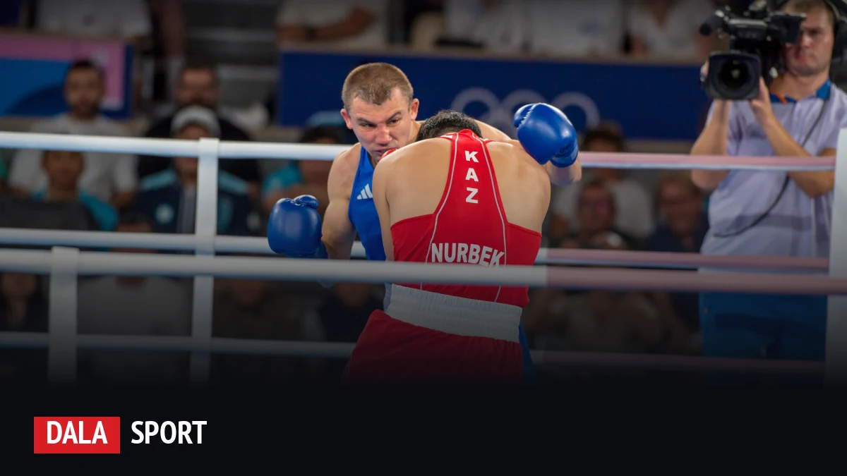 Нурбек Оралбай в финале Олимпиады 2024 года против Александра Хижняка